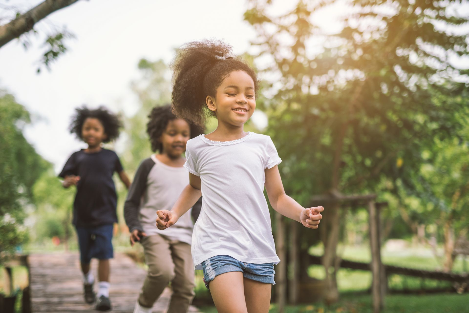healthy children laughing and running